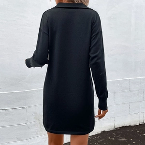 Classic black lapel long-sleeve knit dress with a fitted silhouette, shown from the back