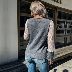 Women's grey knit sweater with lace sleeves and argyle texture back view shown on model