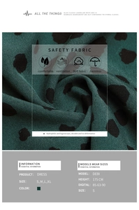 Detail view of dark green polka dot dress fabric showing soft breathable texture and size chart