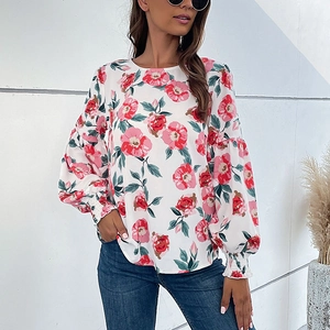 Blouse blanche fleurie à manches longues bouffantes pour femme au style décontracté
