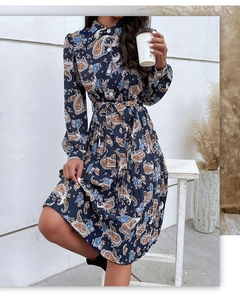 Detail of navy blue paisley floral maxi dress with pleated skirt and waist tie