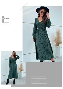 Detail view of V-neck long sleeve maxi dress with knot waist and black polka dots