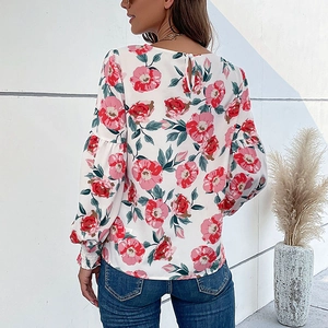 Vue arrière de la chemise fleurie pour femme avec manches lanternes et imprimé floral