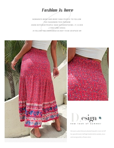 Detail of bohemian floral maxi skirt showing elastic waist and paisley hem print