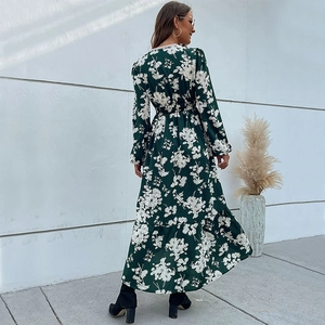 Deep green floral long sleeve ruffle dress with waist tie and irregular flowing hemline