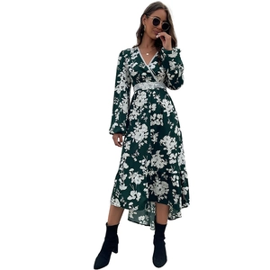 Floral print long sleeve dress with white lace details and an irregular hemline