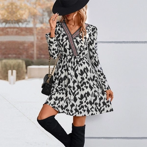 Chic V-neck printed dress with ethnic trim and black white abstract patterns for women