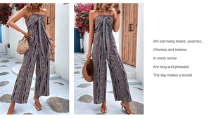Dettaglio tuta con stampa geometrica boho, scollo all'americana e laccetto frontale