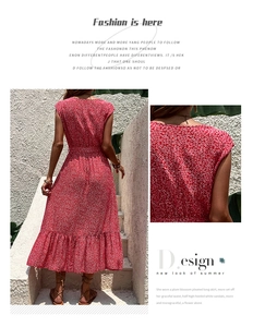 Detail view of the red floral print maxi dress featuring a ruffle hem and back design