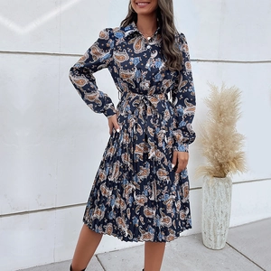 Women's pleated paisley shirt dress with long sleeves and waist belt in navy blue