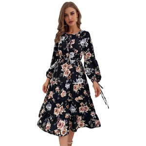 Floral long sleeve midi dress with crew neck and ribbon tie detail in vintage style
