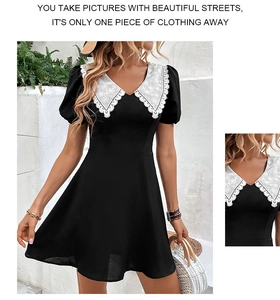 Detailed view of the white hollow lace collar and puff sleeves on the black mini dress