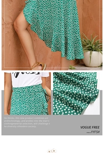 Detail of green floral wrap skirt with side tie and ruffled hem over a white tee