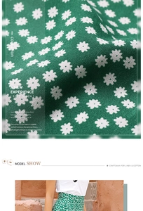 Detailed texture of green linen and cotton floral fabric with a soft touch finish