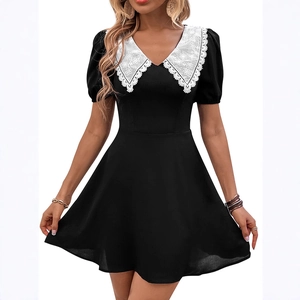 Vintage black A-line mini dress with white lace collar and puff sleeves for women