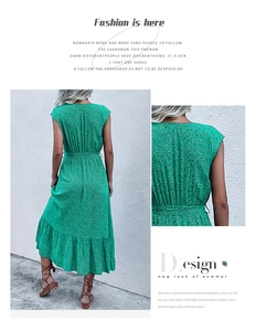 Detailed back view and pleated waist of a green plum blossom print summer maxi dress
