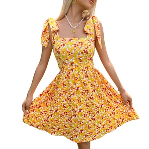 Yellow floral summer mini dress with bow straps and retro square neck for women