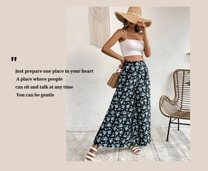 Detail of high-waist floral wide-leg trousers with breezy summer vacation styling