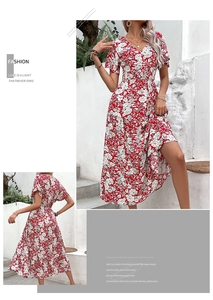 Detailed view of red floral summer maxi dress featuring V-neckline and high-waisted design