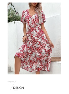 Detail of red floral chiffon summer dress with V-neckline and elegant short sleeves