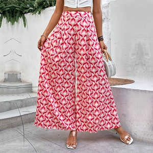 Pantalon évasé taille haute avec imprimé cœurs géométriques colorés et tissu fluide