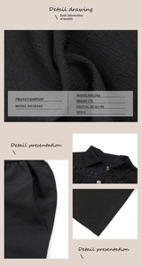 Detailed view of black jumpsuit with shirt collar, geometric embroidery and round buttons