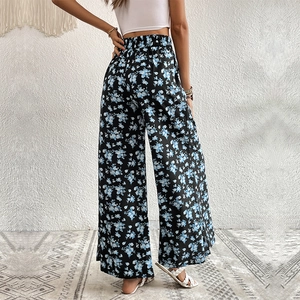 Women's high waist wide leg flare trousers with blue floral print on black fabric