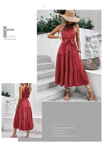 Detail of tiered dark red midi dress with halter neck and matching waist tie