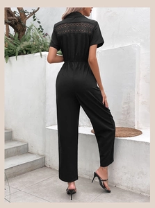 Detail of the elegant lace back design on this slim black summer short sleeve jumpsuit