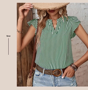 Detail of green striped V-neck summer blouse with flutter sleeves and ruffles