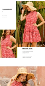 Detailed view of red floral sleeveless halter dress with elegant pleated texture