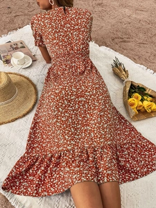 Boho floral midi dress in brick red with puff sleeves and ruffled hem for summer
