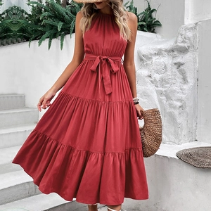 Women's red sleeveless halter dress with tiered skirt and waist tie for summer resort style