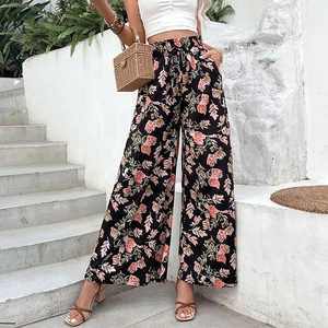 Casual high waist floral wide-leg trousers with drawstring and side pockets in summer style