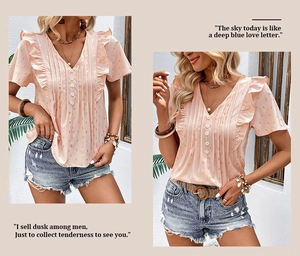 Detail of pink chiffon top with gold polka dots, ruffled sleeves and V-neckline buttons