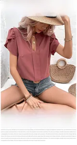 Detail of dusty rose V-neck chiffon blouse with layered ruffled sleeves for women