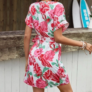 Women's white floral mini dress with pink peony print and waist tie in outdoor style