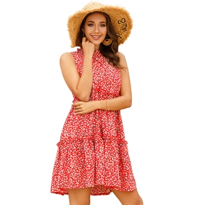 Red floral sleeveless halter dress with white daisy print and ruffled hemline