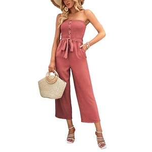 Summer strapless wide-leg jumpsuit in dusty rose with button front and belted waist