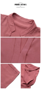 Detail view of V-neckline and flutter sleeves on a dusty rose woven chiffon blouse