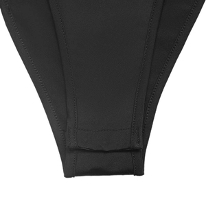 Macro detail of the crotch closure and hemmed edges on a black lace bodysuit