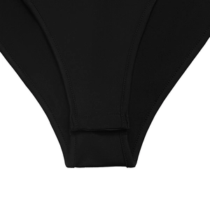 Detailed macro view of the crotch area closure and fine stitching of the bodysuit
