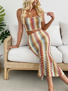 Close-up of colorful zig-zag knit texture on summer tube top and slim maxi skirt set