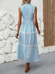 Rear view of long blue striped sleeveless summer dress with lace trim and smocked back detail