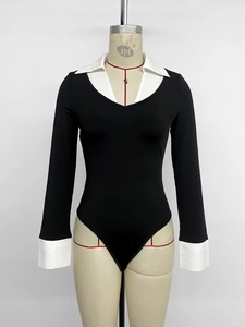 Detail of slim-fit bodysuit with contrasting white collar and V-neck layered design