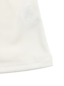 Detailed close-up of white knitted t-shirt hem with professional double-needle stitching