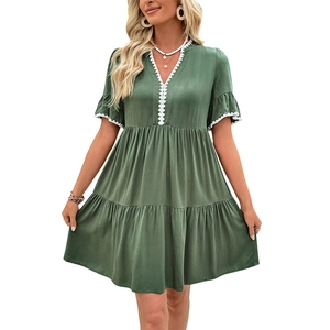 Dark green V-neck A-line dress with white lace trim and tiered ruffle hemline