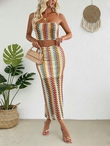 Detail of colorful striped tube top and high waist long skirt for bohemian vacation style