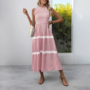 Detail of French striped maxi dress with lace stitching and smocked bodice texture