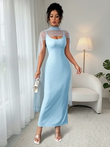 Detail of light blue bodycon strap dress with matching sheer mesh shrug and knit texture